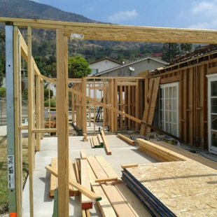 beginning stages of framing for covered patio and master bedroom addition