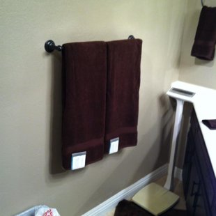 installed new towel holder and staged with new towels