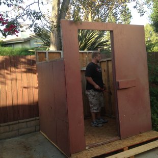 helping my friend move shed from his old house to his new residence