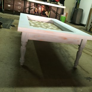 sanded it up to give a rustic feel and lightly added streaks of white paint to enhance 