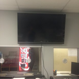 TV wall mount in commercial building. Anchored into metal studs