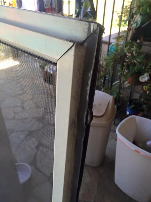 replaced broken wheel on screen door