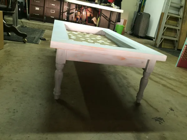 sanded it up to give a rustic feel and lightly added streaks of white paint to enhance 